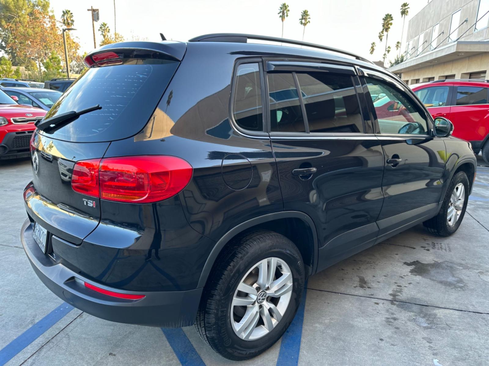 2016 Black /Black Volkswagen Tiguan (WVGAV7AX5GW) , AUTOMATIC transmission, located at 30 S. Berkeley Avenue, Pasadena, CA, 91107, (626) 248-7567, 34.145447, -118.109398 - Crown City Motors is a used “Buy Here Pay Here” car dealer in Pasadena CA. “Buy Here Pay Here” financing, means that when you purchase your vehicle from our dealership, that you make the payments to the dealership as well. We do not need the banks approval to get you approved for a used auto - Photo #5